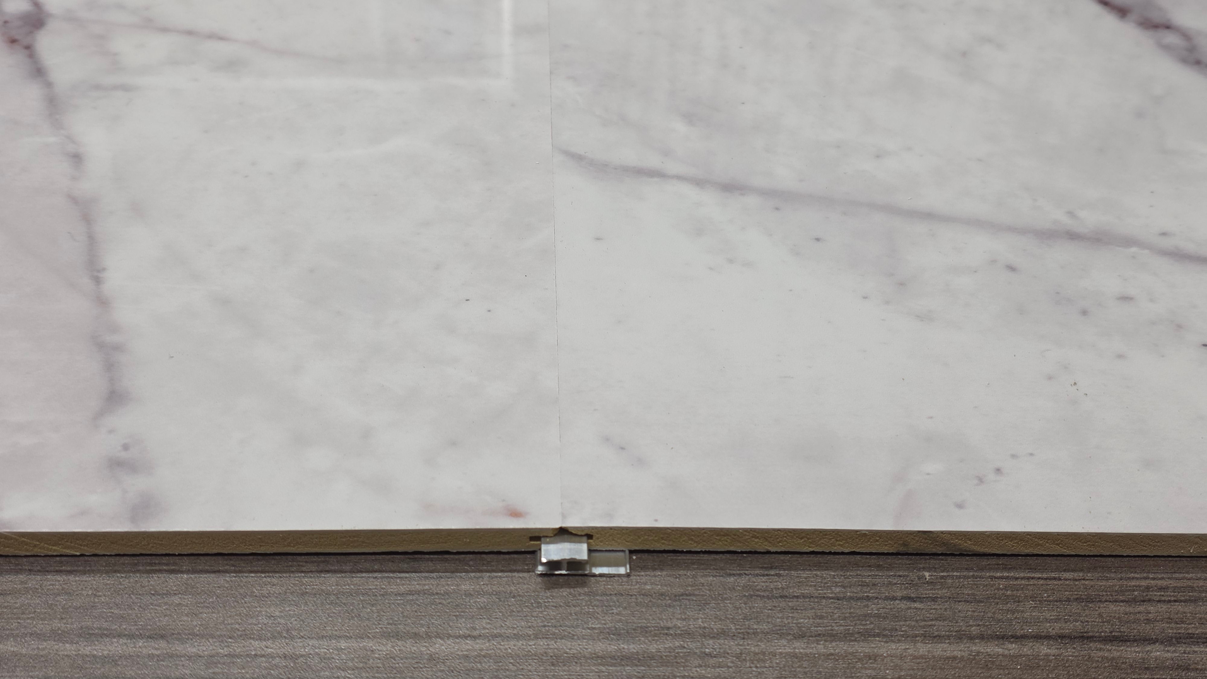 Calacatta White PVC wall panel 48x108 marble design

Flexstone Calacatta White seamless wall panel installation

Calacatta White wall panel bathroom feature wall

Marble PVC wall panel direct to stud installation

Calacatta White commercial wall panel interior
Calacatta White residential wall panel interior